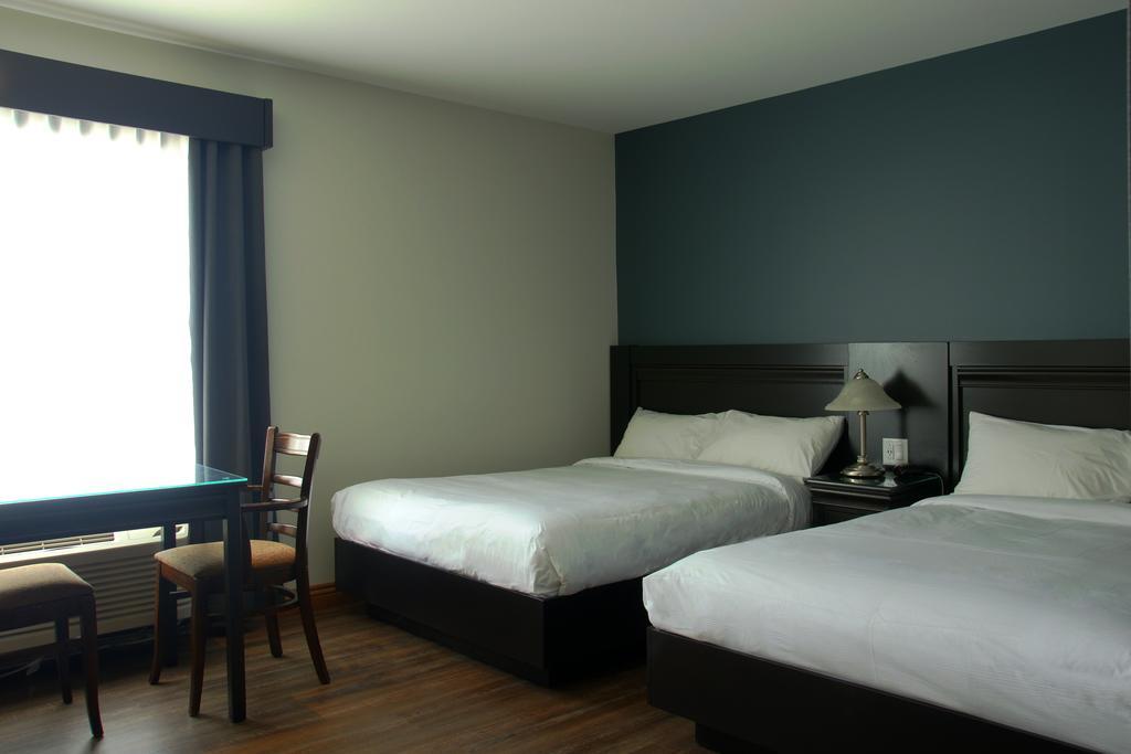 Hotel Le Montagnais Saguenay Exterior foto